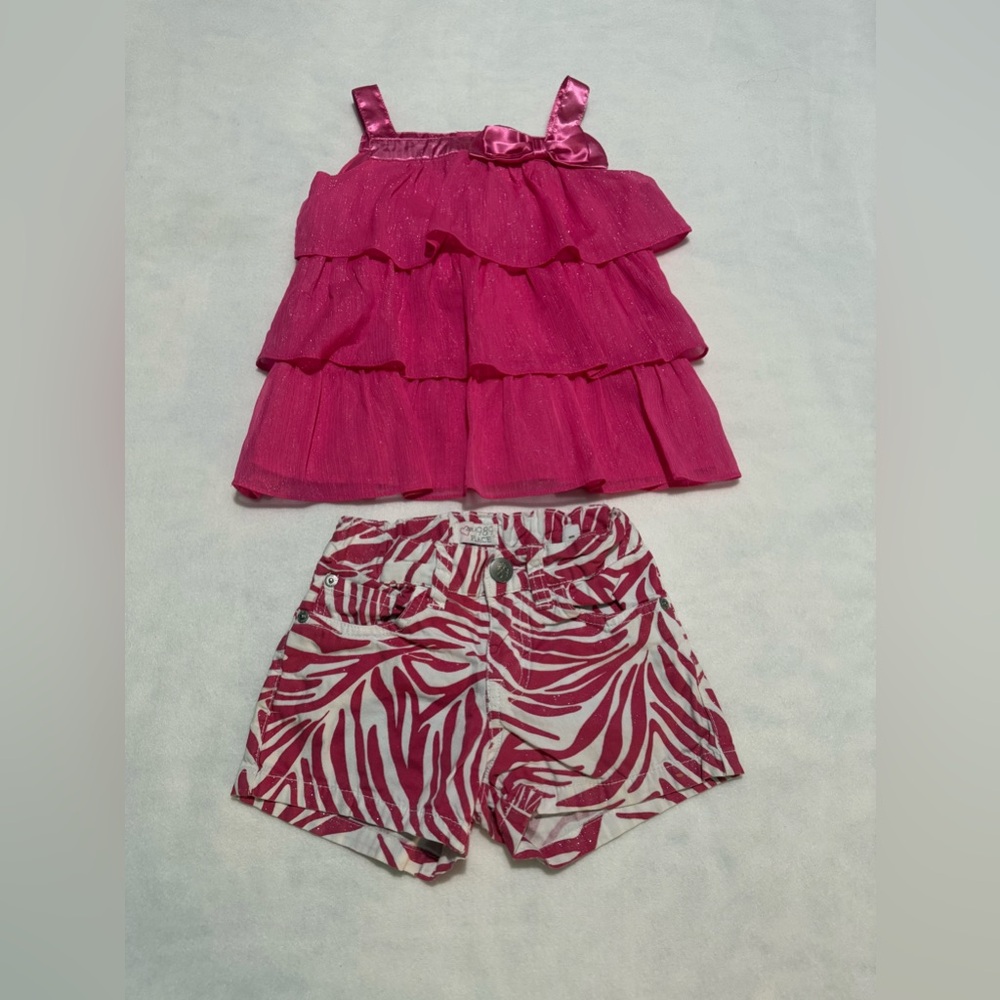 A matching set of pink Top and shorts